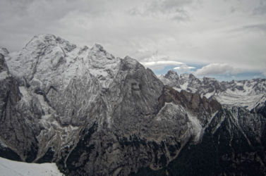The right hand side of Marmolada with a dramatic view into the valley The right hand side of Marmolada with a dramatic view into the valley
