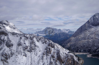 On the way back I was treated to a sneaky glimpse of Civetta out of the clouds for a change. Another far distant view of Civetta with lake Fedaia in the foreground a long way below