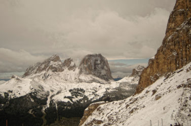 Sassos Longo in the distance A view of Sasso Longo in the Distance under dark clouds