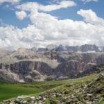 Sella over Vallunga Valley behing the Cir Group. Green slopes with the Sella Massif beyond
