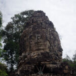 Faces overlooking the east Gopura Faces overlooking the east Gopura