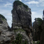 Rope hanging off one of the pinnacles, there must be climbers about Rope hanging off one of the pinnacles, there must be climbers about