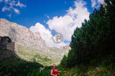 The path in front of us Gemma standing in front of the rising valley and path in front of us
