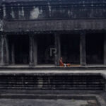 Monk in the cloisters within the first gallery Monk in the cloisters within the first gallery