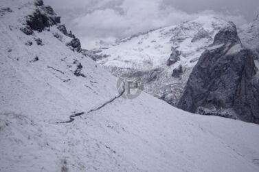 The path leading us on to our first direct views of Marmolada. A great view of the path and Marolada in the near distance just beyond where the path turns.