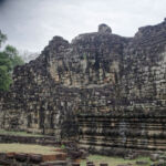 The massive reclining Buddha built into the western wall of the Baphuon The massive reclining Buddha built into the western wall of the Baphuon