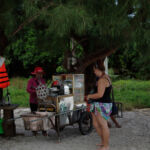 Gemma buying palm sugar at Koh tuic Gemma buying palm sugar at Koh tuic