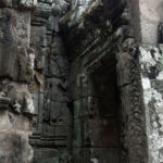 Another doorway at the Bayon temple with intricate carvings Another doorway at the Bayon temple with intricate carvings