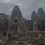 Statues on the path leading to Bayon temple Statues on the path leading to Bayon temple