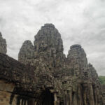 Bayon temple seen from the corner with the outer gallery Bayon temple seen from the corner with the outer gallery